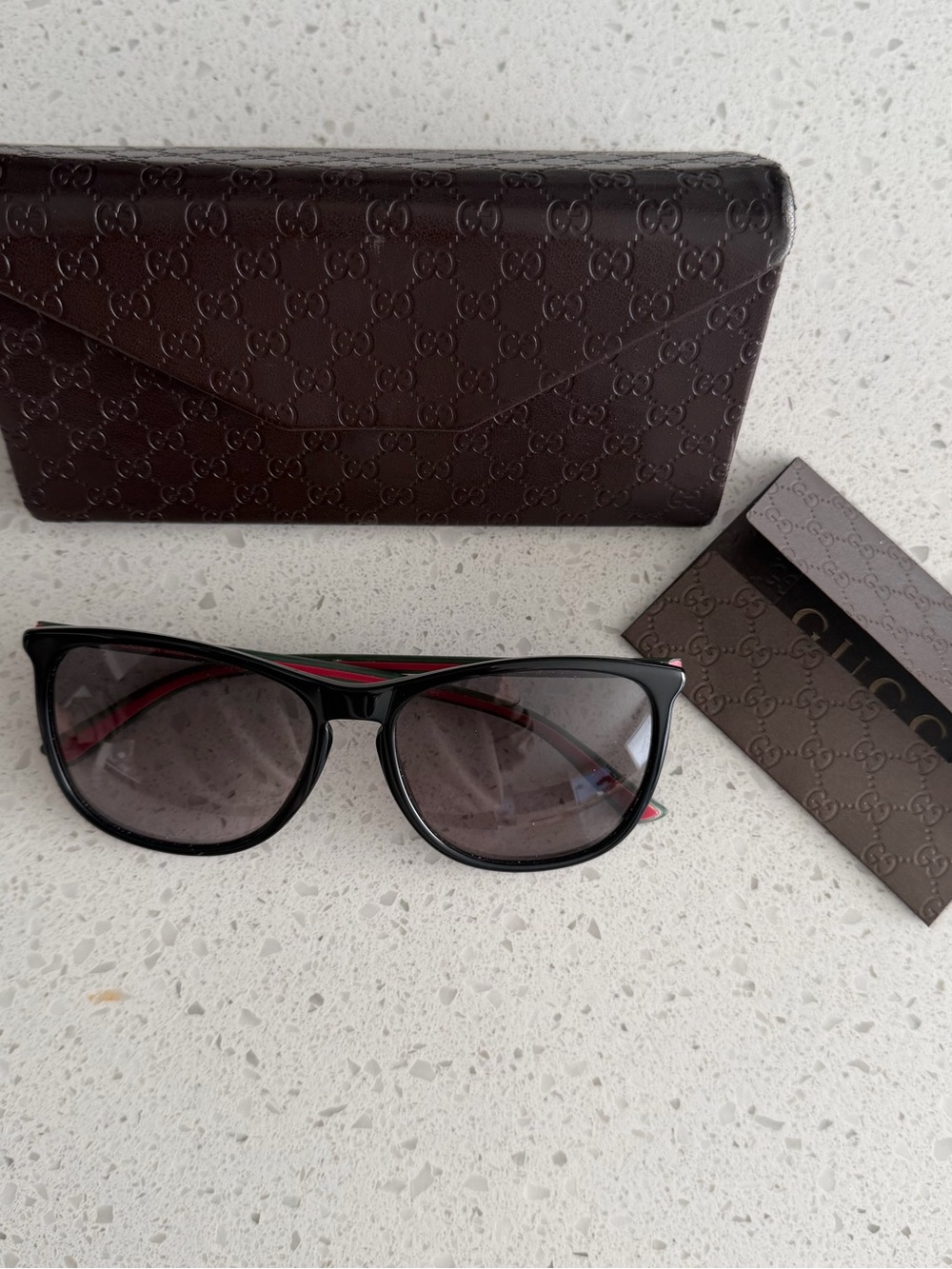 Gucci Black Sunglasses with Red Interior Trim